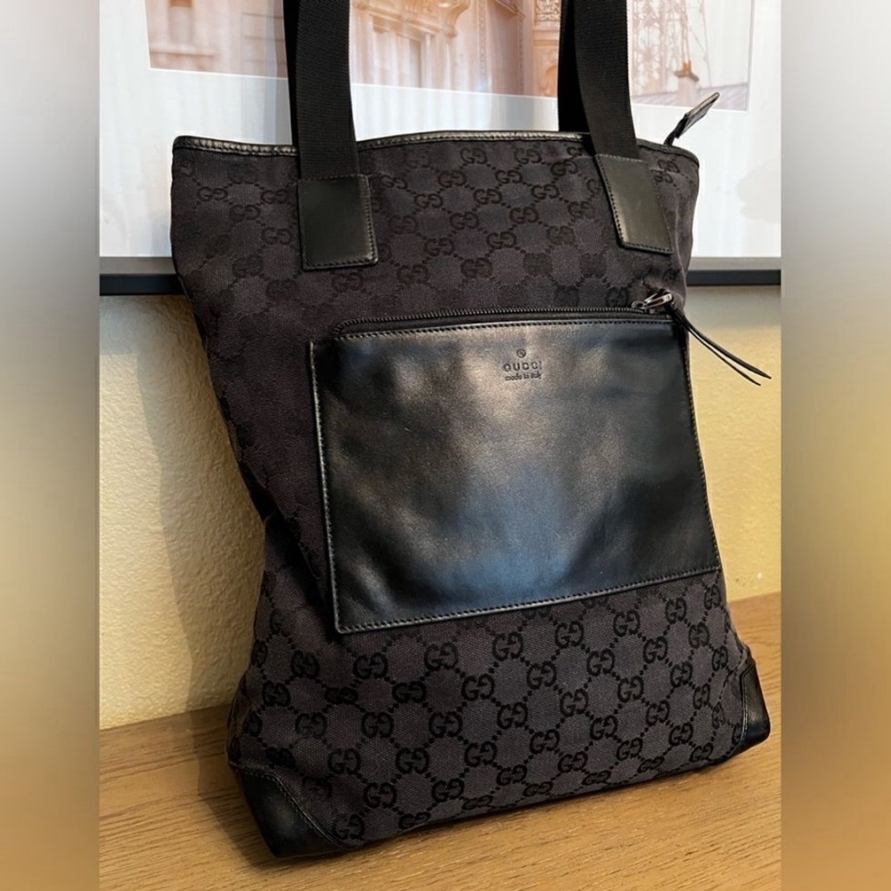 Authentic Gucci nylon calfskin monogram tall tote in black.
